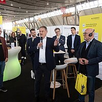 Franz Loogen, e-mobil BW, bei der Eröffnung der i-Mobility 2026 am Messestand.