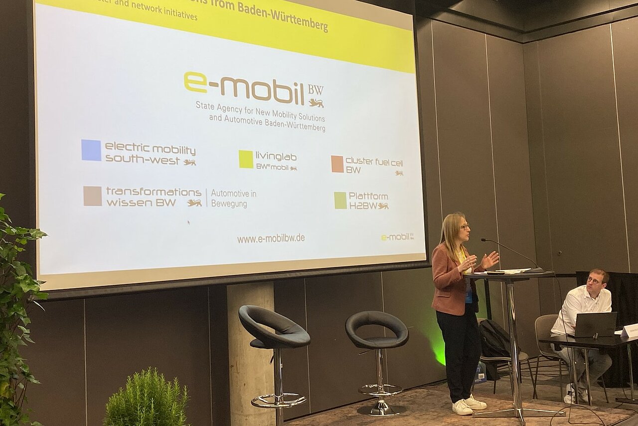 Katja Gicklhorn, Director of Industrialisation at e-mobil BW, during a presentation at EVS35 in Norway.