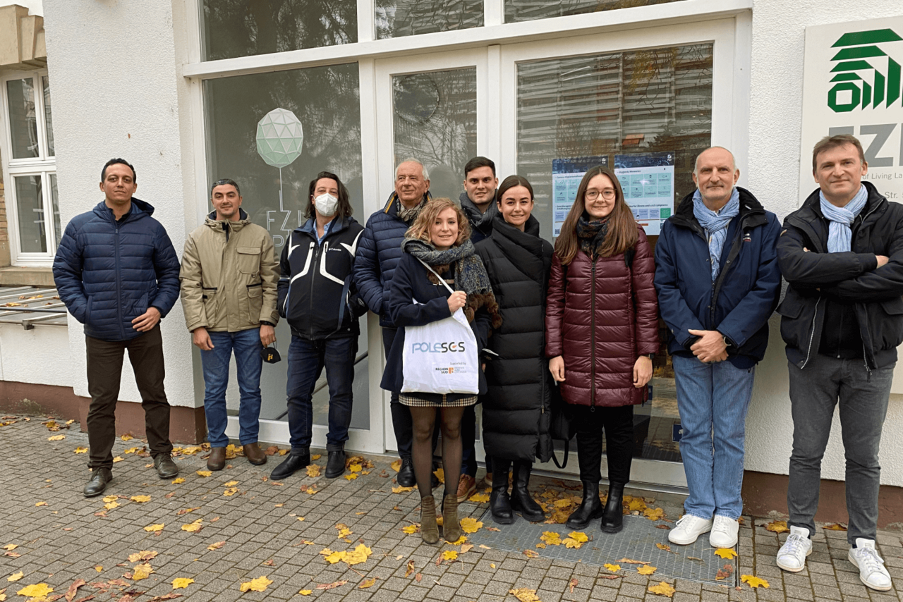Group photo in front of the House of Living Labs (HOL) of the FZI.