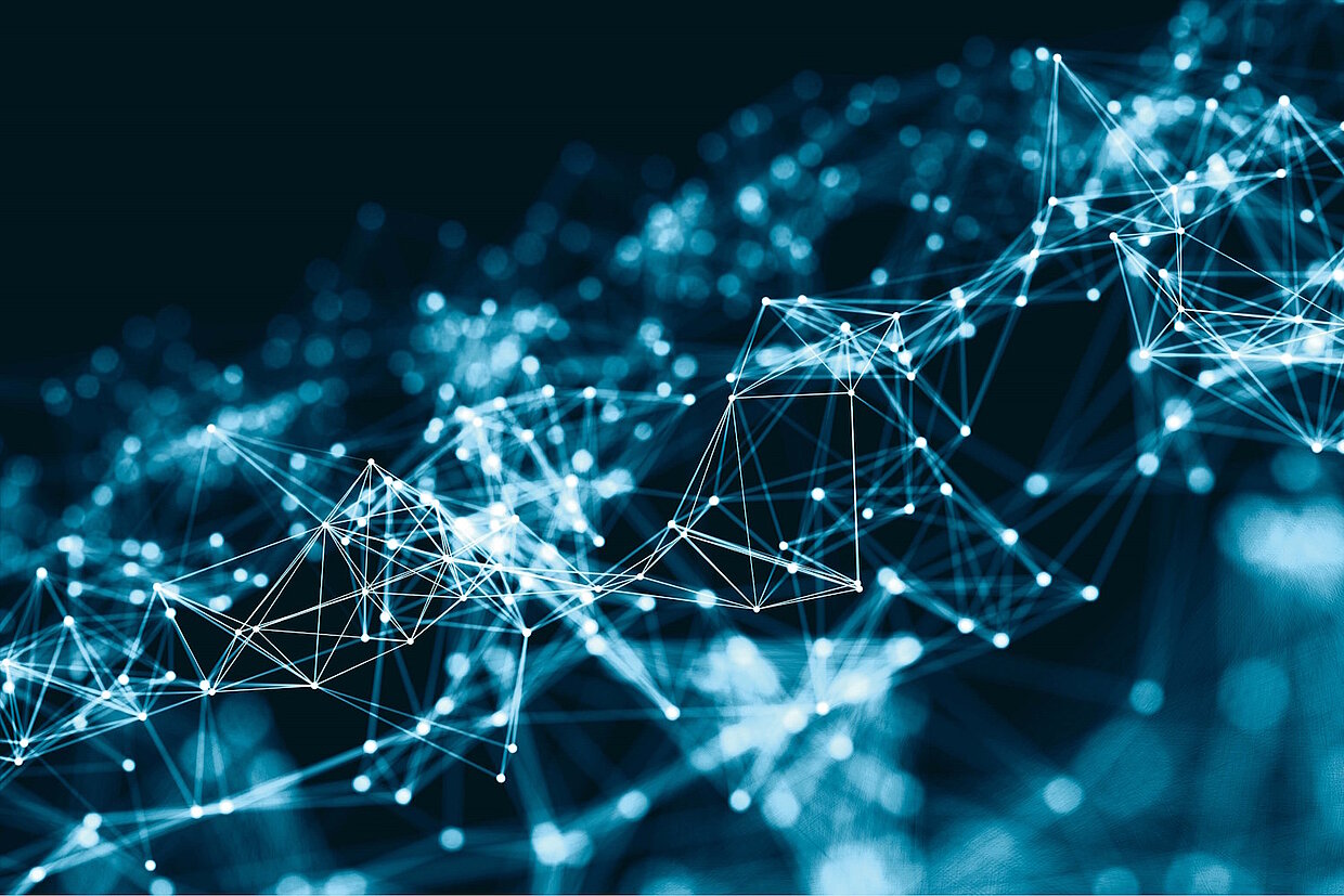 Vernetzung Digitalisierung Netzwerk unzählige weiße Punkte auf nachtblauem Hintergrund durch weiße Linien miteinander verbunden symbolisieren ein Netzwerk